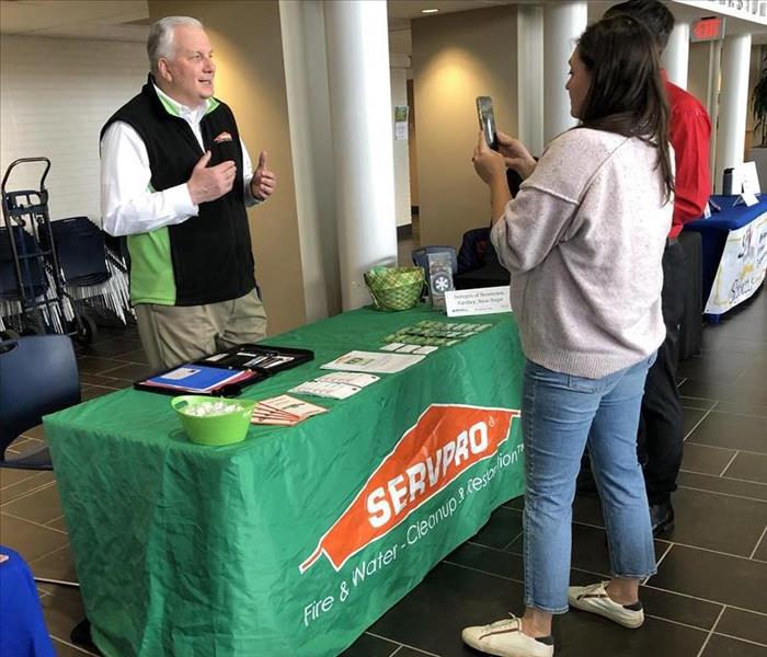 Our Business Development Executive, Bill Wise, speaking with community members about SERVPRO at the NBA Job Fair.